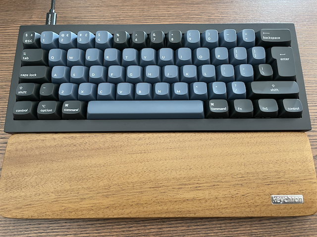 Keychron Q4 mechanical keyboard and wooden palm rest